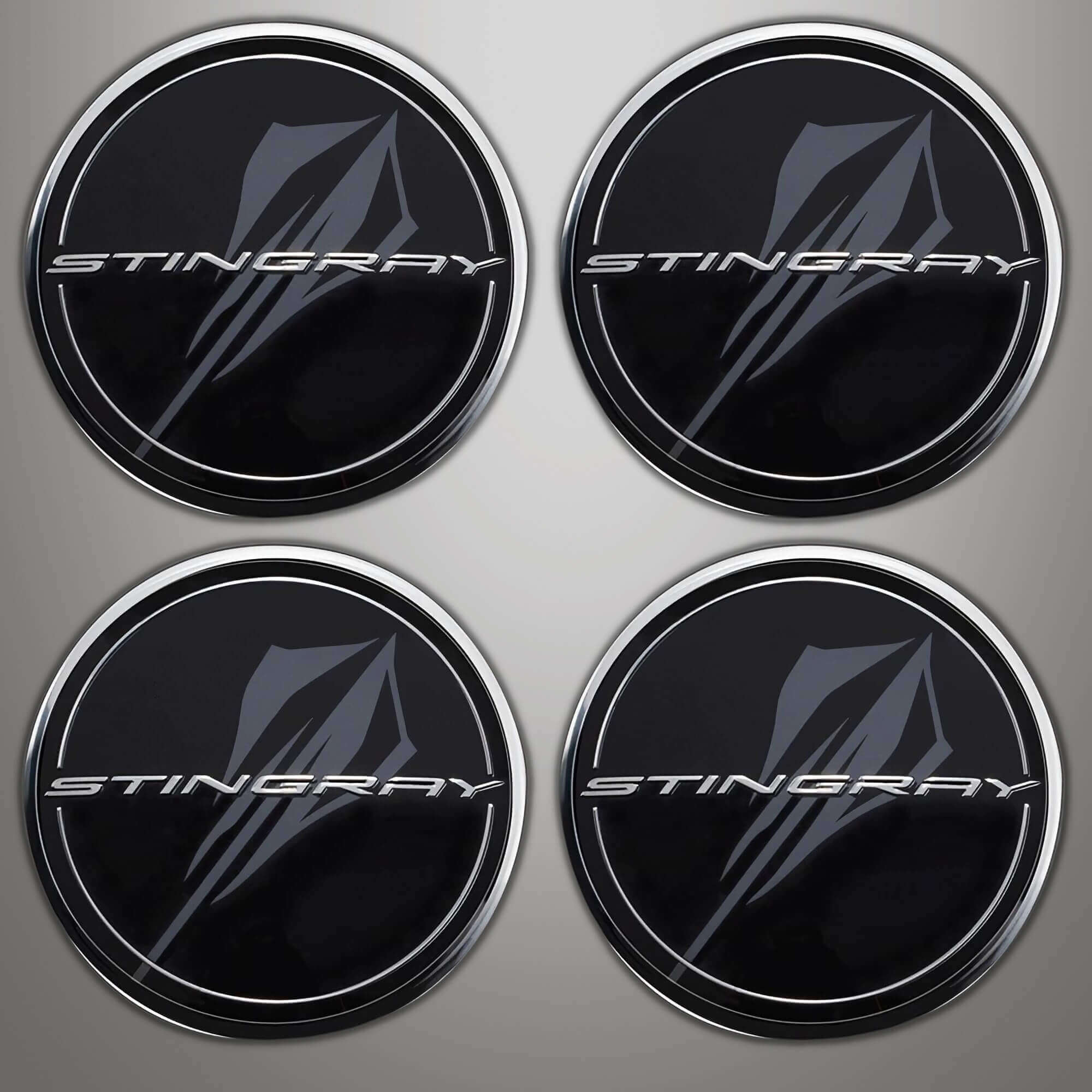 Black wheel center caps with Gray Stingray logo $260